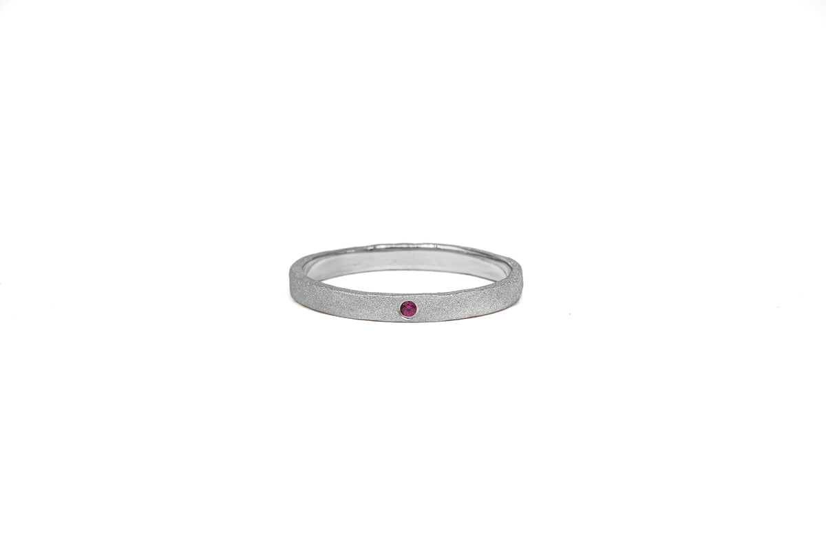 Hammered and Sandblasted White Gold Ring with Ruby