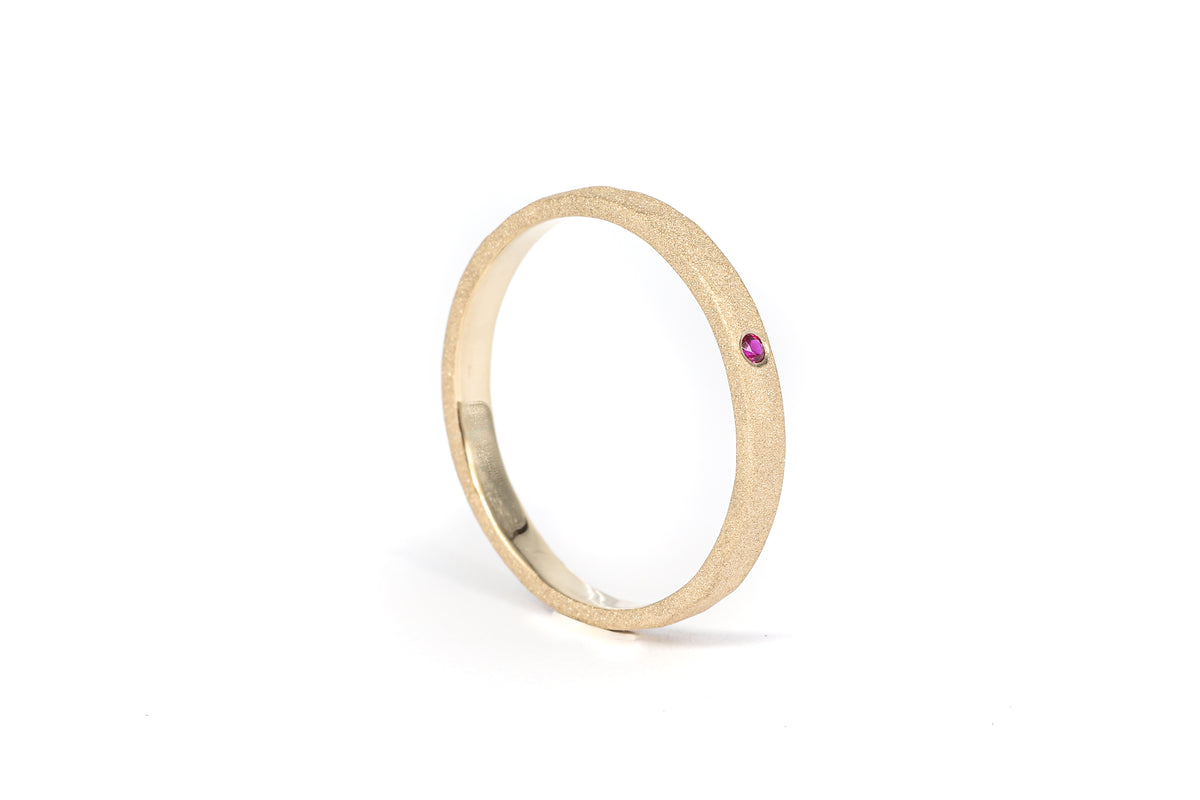 Hammered and Sandblasted Yellow Gold Ring with Ruby