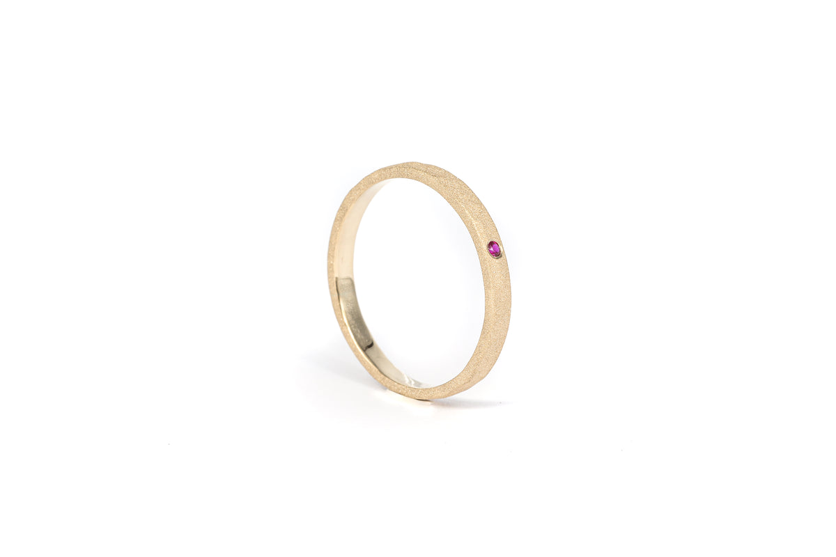 Hammered and Sandblasted Yellow Gold Ring with Ruby