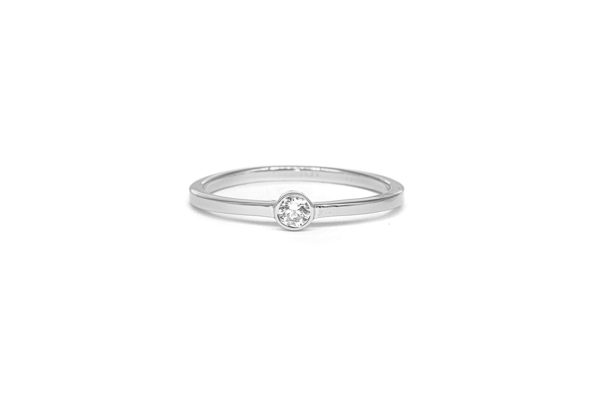 Moissanite Solitaire Ring in 14 Karat White Gold (0.10 Carat)