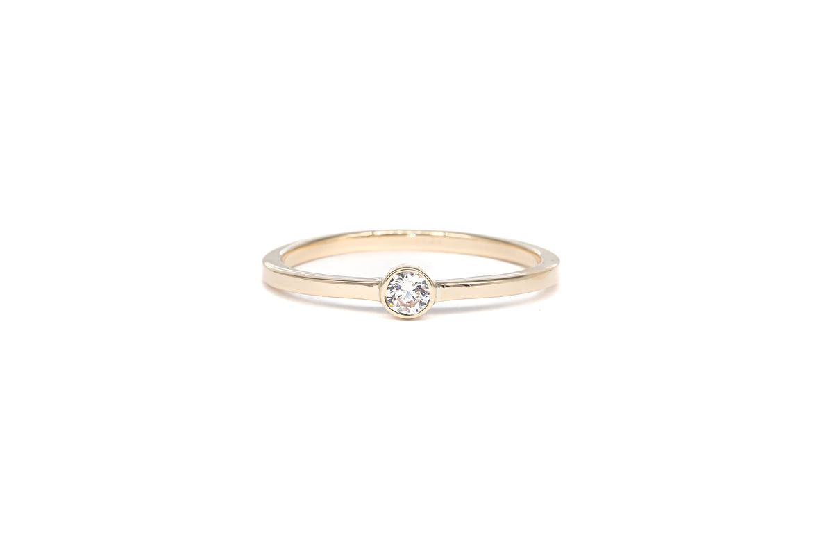 Moissanite Solitaire Ring in 14 Karat Yellow Gold (0.10 Carat)