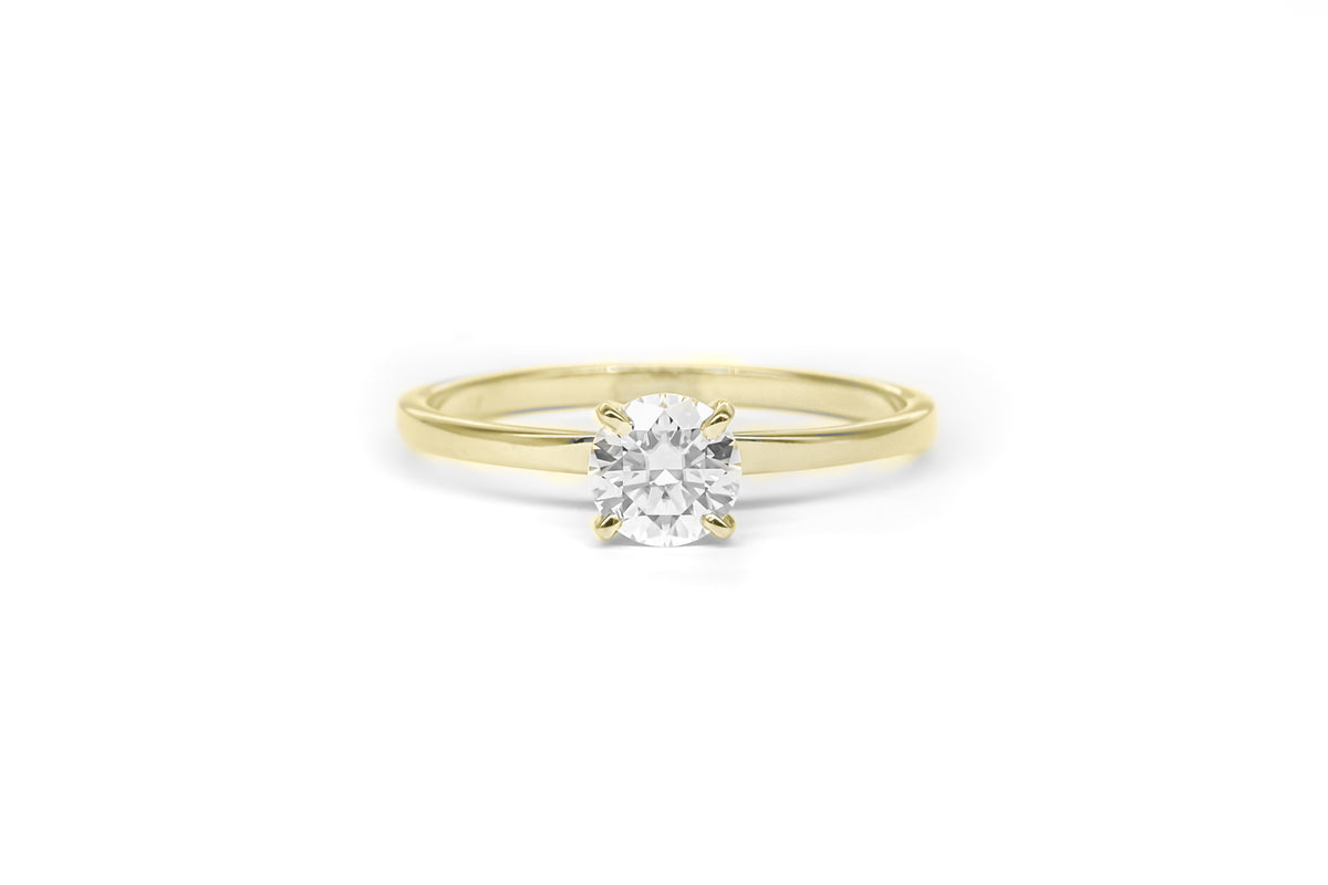 Moissanite Solitaire Ring in 18 Karat Yellow Gold (0.85 Carat)